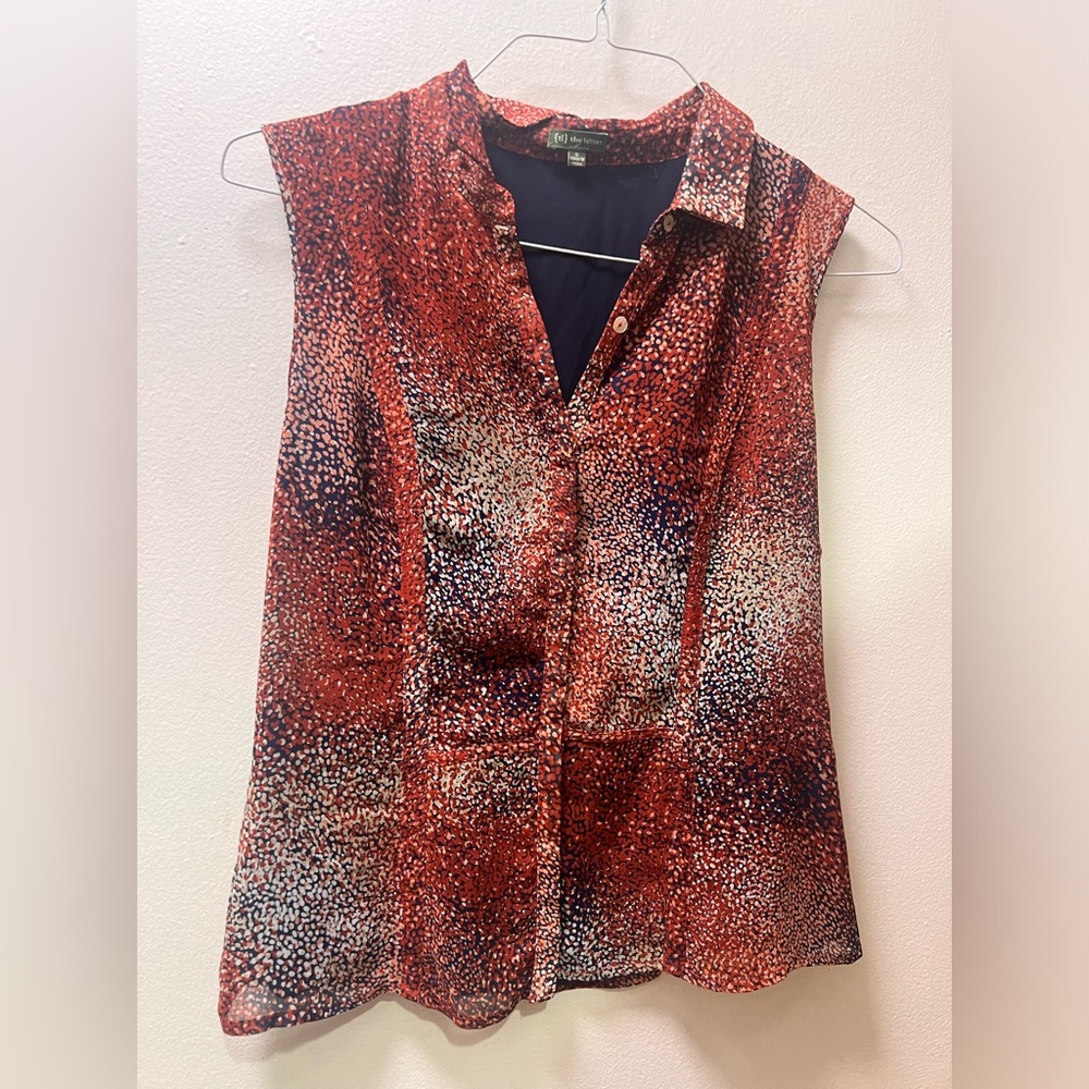 Beautiful blouse!! Lightweight and button up